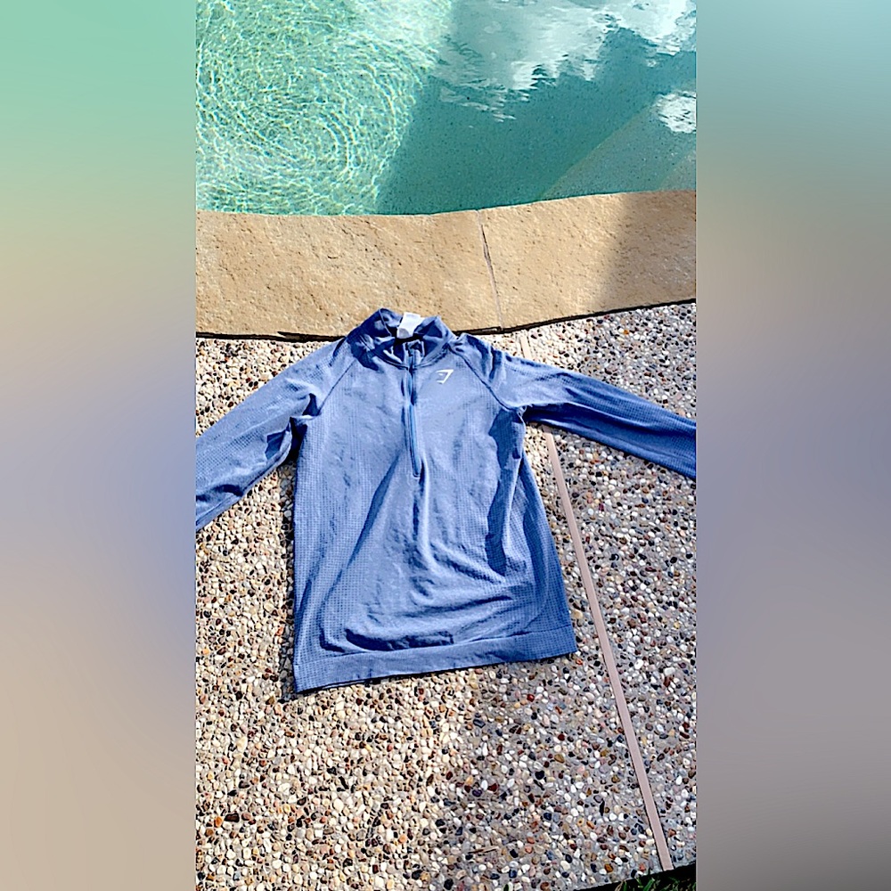 GYMSHARK zip up jacket. The color is blue and size is L